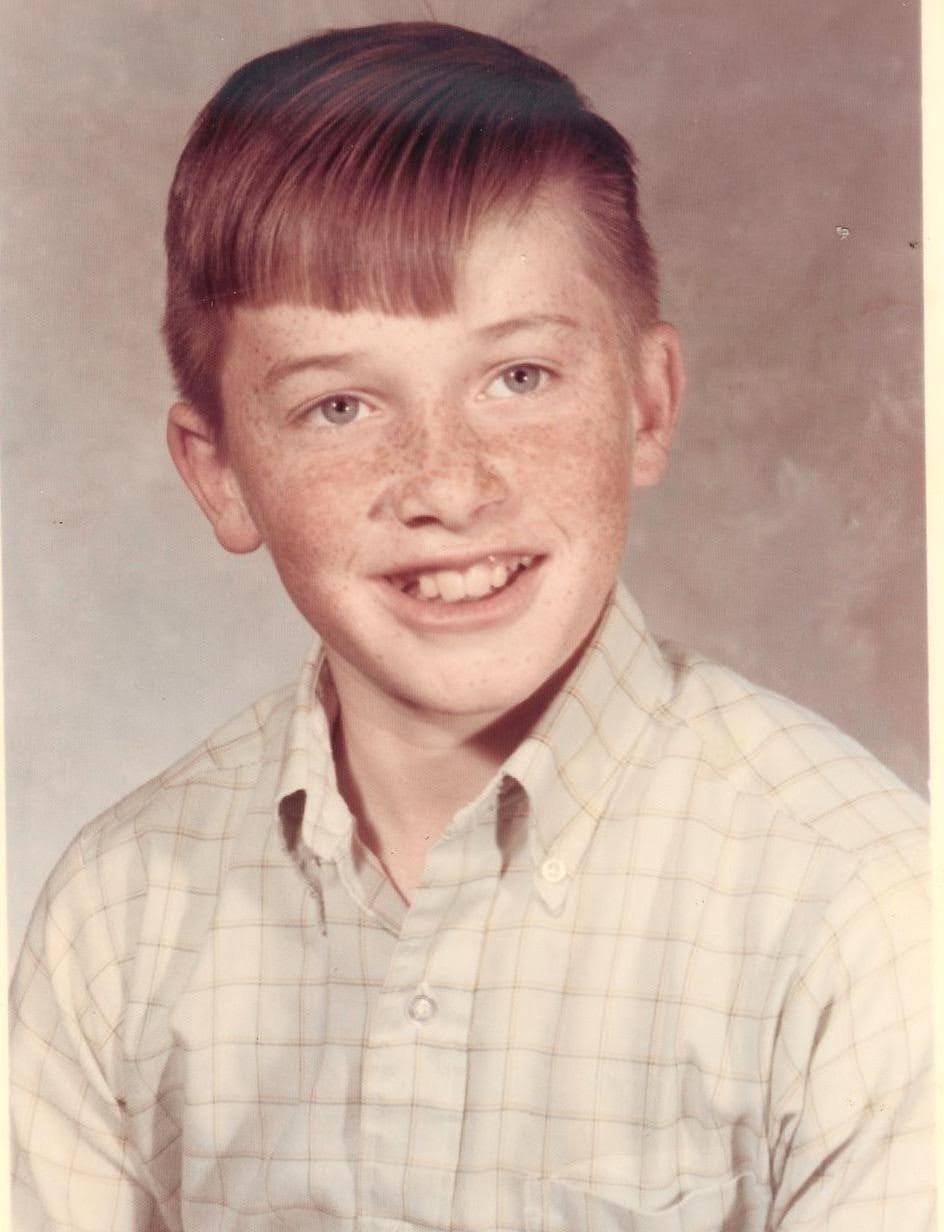 School photo of John Giles as a child